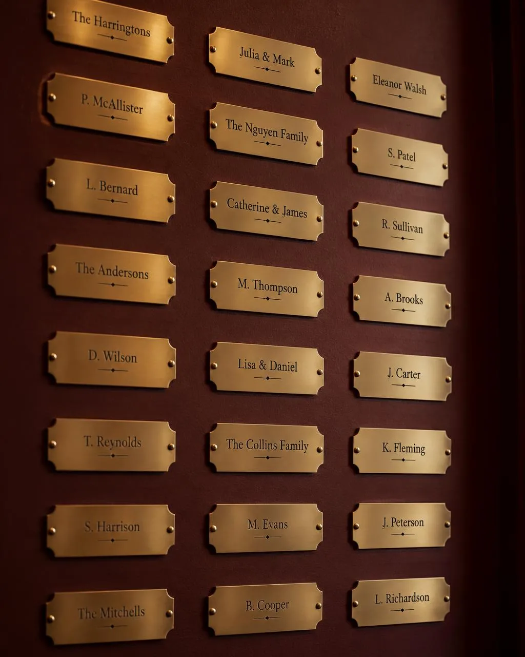 Wall of engraved brass nameplates